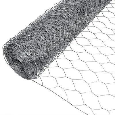 A roll of hexagonal wire mesh fencing, also known as chicken wire or hardware cloth, is shown against a white background. The mesh is tightly wound, with the hexagonal pattern clearly visible.