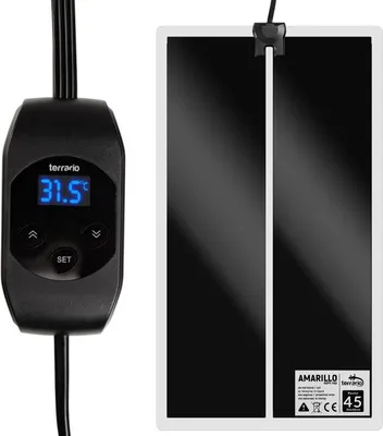 A black heating mat with a digital thermostat and temperature display.