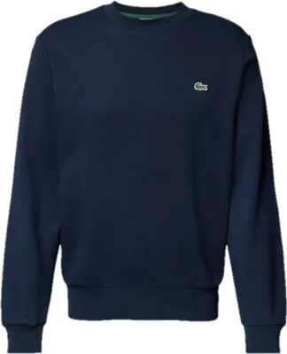 A navy blue Lacoste sweatshirt is shown against a white background.