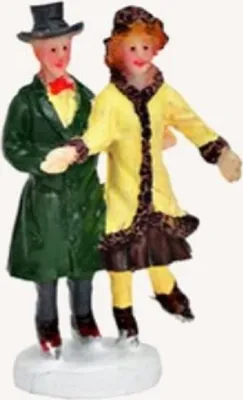Eine Figur von zwei Eisläufern, einem Mann und einer Frau, die Hand in Hand auf einer Eisbahn stehen