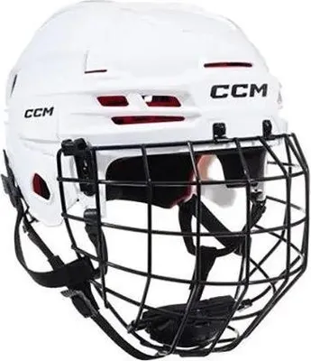 A white CCM Tacks 70 hockey helmet with a black cage is shown against a white background.