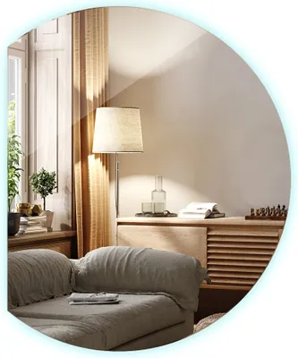 A living room scene with a couch, lamp, and cabinet.