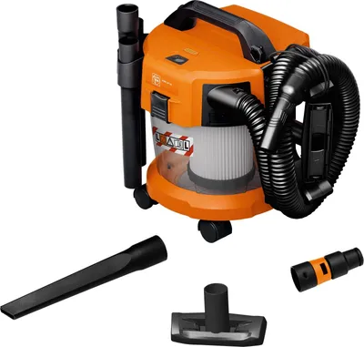 An orange and gray industrial vacuum cleaner with various attachments displayed on a white background.