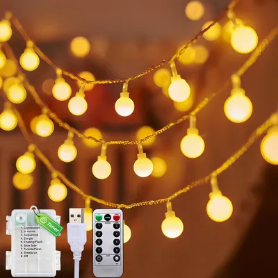 Immagine prodotto di 12 metri + 1 metro di filo luminoso con 100 LED. Decorazione luminosa, 8 modalità. Catena luminosa per interni, alimentazione a batteria o tramite USB