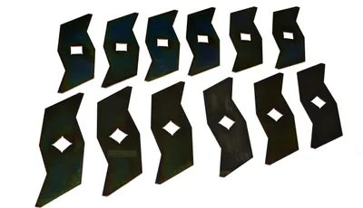 A collection of metal blades arranged on a white background.