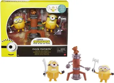 A product packaging box containing Minions toys, with some of the toys displayed outside the box.