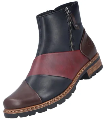 Auf dem Bild ist ein mehrfarbiger Stiefel zu sehen der aus verschiedenen Materialien besteht. Der Stiefel ist von der rechten Seite abgebildet und zeigt eine Seite mit Schnürung und Reißverschluss.