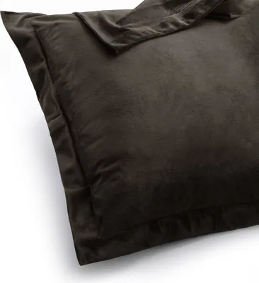 A close-up view of a dark brown pillowcase.