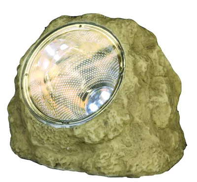 A solar-powered garden light designed to look like a rock.
