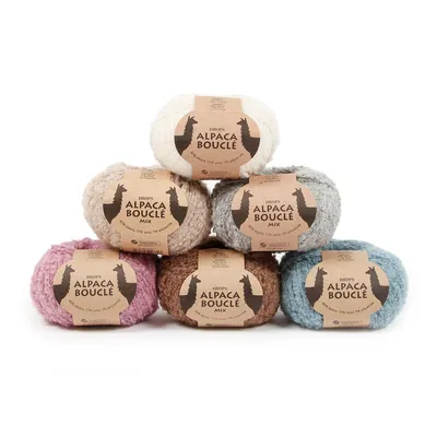 Produktbild von Drops Alpaca Bouclé (50g/140m) 8903 schwarz