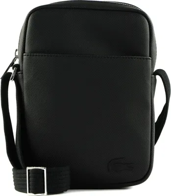 A black Lacoste crossbody bag is shown against a white background.