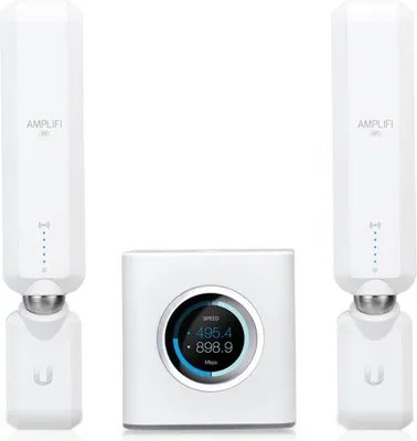 A product shot of a Ubiquiti AmpliFi AFi-HD router and two mesh points, arranged on a white background.