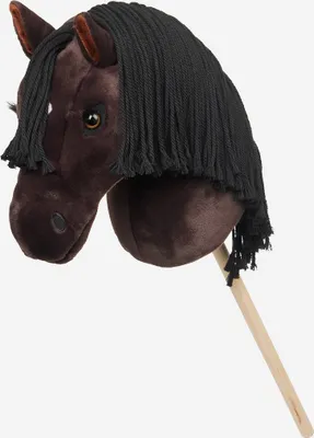 A brown hobby horse on a stick against a white background.