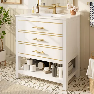 Image de Meuble sous-vasque blanc de 76 cm avec vasque en céramique – 2 tiroirs, poignées dorées, meuble de salle de bains indépendant pour salles de bains modernes