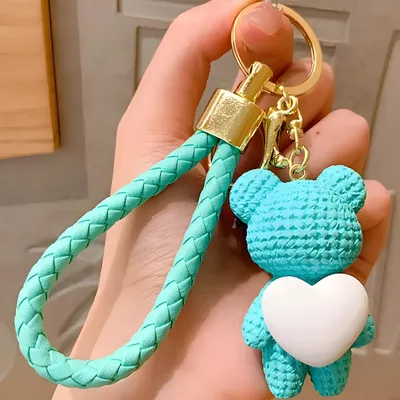 Immagine prodotto di Portachiavi Orsetto Turchese e Bianco - Accessorio Elegante e Originale KP41109