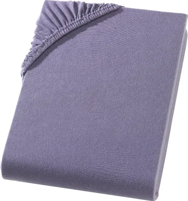 A folded fitted sheet with elasticated corners.