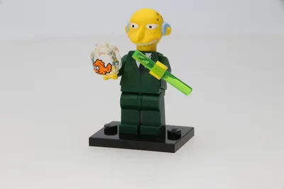 A Lego minifigure of Mr. Burns from The Simpsons, standing on a black base.