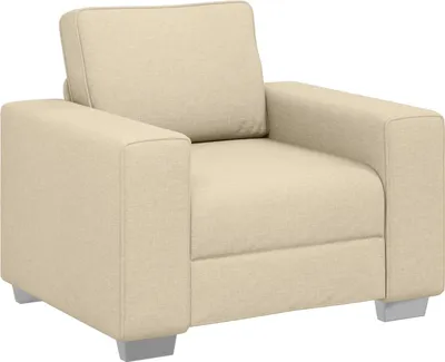 A studio shot of a single beige armchair.