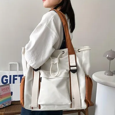 Image de Grand sac à bandoulière à blocs de couleur, sac à bandoulière simple en nylon. Idéal pour les trajets domicile-travail, sac à bandoulière confortable. Convient aux femmes, comme sac d'étudiant, sac de voyage ou sac de courses (blanc).