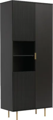 A black tall cabinet with fluted doors and a gold handle, standing on thin gold legs.