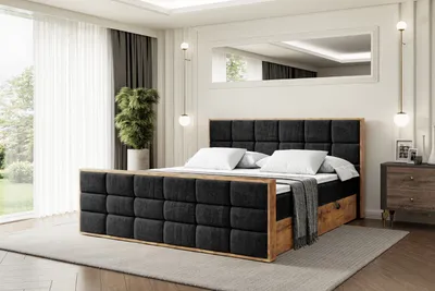 A bedroom scene with a bed as the main focus, set against a backdrop of curtains, a plant, and a dresser.