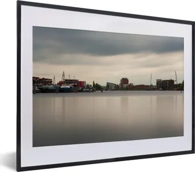 Produktbild von MuchoWow® MuchoWow® Gerahmtes Poster Skyline - Haarlem - Wasser 40x30 cm - Poster mit zchwarzem Bilderrahmen - Bilderrahmen - Poster im Rahmen