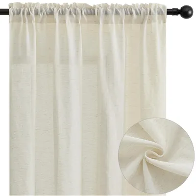 A close-up view of a beige linen-look curtain hanging on a dark curtain rod.