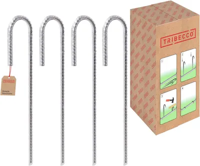 Four metal ground anchors are shown in a studio setting next to a cardboard box with instructions.