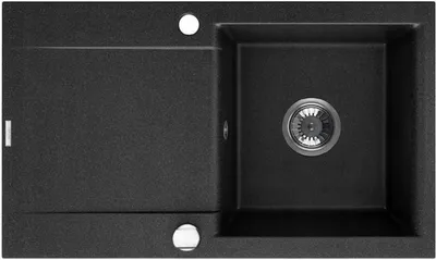 A top-down view of a black kitchen sink with a drain and a drying area.