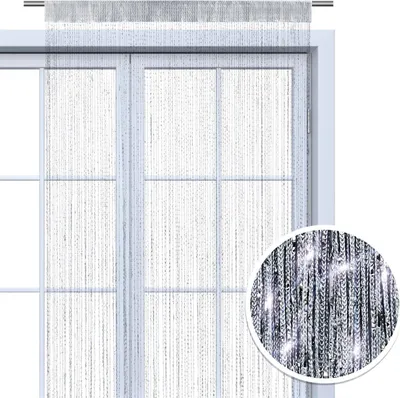 A beaded curtain hanging on a sliding glass door.