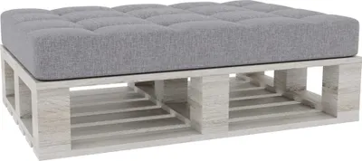 A tufted gray cushion on a light wood pallet base.
