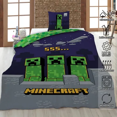 A Minecraft-themed duvet cover and pillowcase set displayed on a bed.
