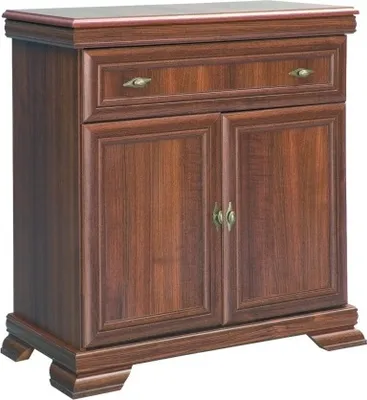 A studio shot of a wooden chest of drawers.