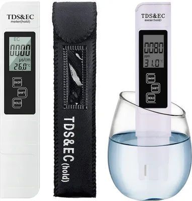 A digital TDS and EC meter with its protective sleeve and a glass of water.