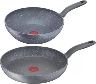 Two non-stick frying pans, one wok and one standard frying pan, are shown against a white background.