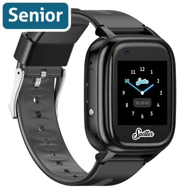 A black Spotter Senior GPS watch with a gray strap is shown against a white background. The watch face displays the time and date.