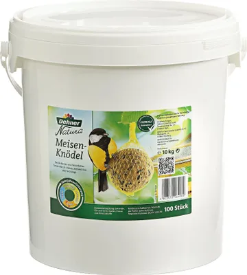 A white bucket containing bird food.