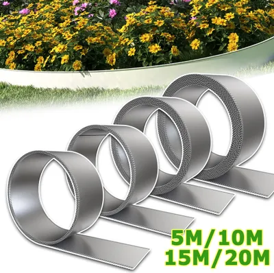 A garden scene with yellow and pink flowers in the background, and several rolls of silver garden edging in the foreground.