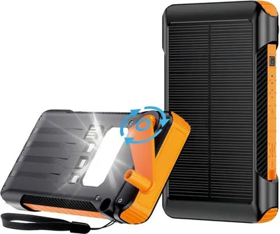 A solar and hand-crank power bank is shown against a white background. One unit is upright showing the solar panel, and another is angled to reveal a hand crank and LED lights.