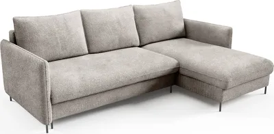 A beige sectional sofa with a chaise lounge is shown from a slightly elevated side angle against a white background.