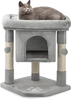 A gray cat is resting on a gray cat tree with scratching posts and a small house.