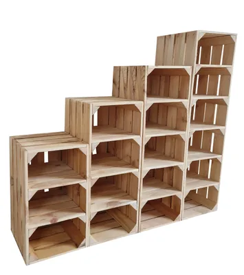 A modular shelving unit made of wooden crates stacked in a staircase pattern.