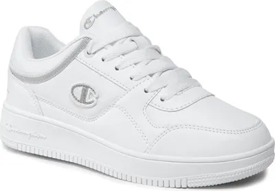 A studio shot of a white Champion sneaker.