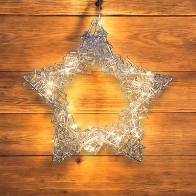 Produktbild von Strieborná drôtená hviezda osvetlená 30 LED diódami - batéria a časovač