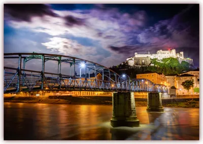 Produktbild von XXL Poster 100 x 70cm (F-224) Blick auf Salzburg und die Brücke Mozartsteg bei Nacht (Lieferung gerollt!)