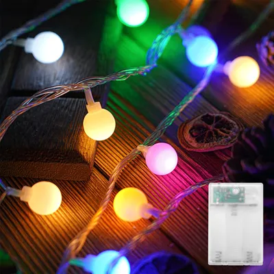 Imagen del producto de Guirnalda de luces LED, 2 metros, 20 bombillas de colores, funciona con pilas e incluye función de parpadeo