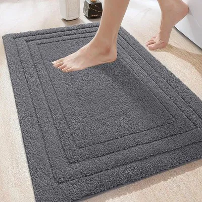 Immagine prodotto di Tappetino da bagno antiscivolo in microfibra Unyqoos®, ideale per bagno e doccia, dimensioni 40 x 60 cm, colore grigio scuro con base antiscivolo in TPR