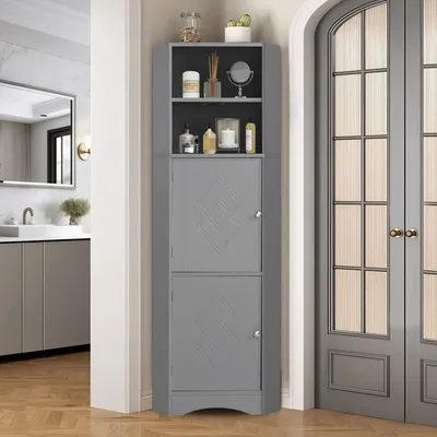 A gray corner cabinet with open shelves and two closed cabinets, placed in a hallway next to a door and a bathroom entrance.