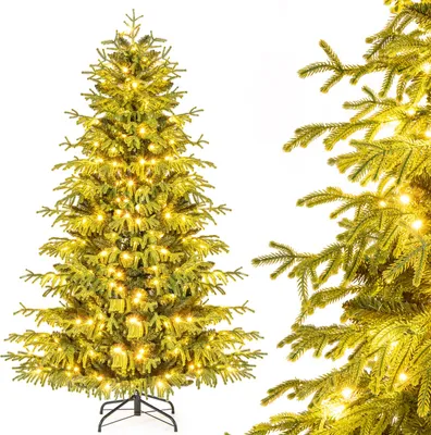 A full shot of a decorated artificial Christmas tree with warm white LED lights against a white background. A close-up of the tree's branches is visible on the right side.