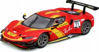 A red and yellow Ferrari racing car model.